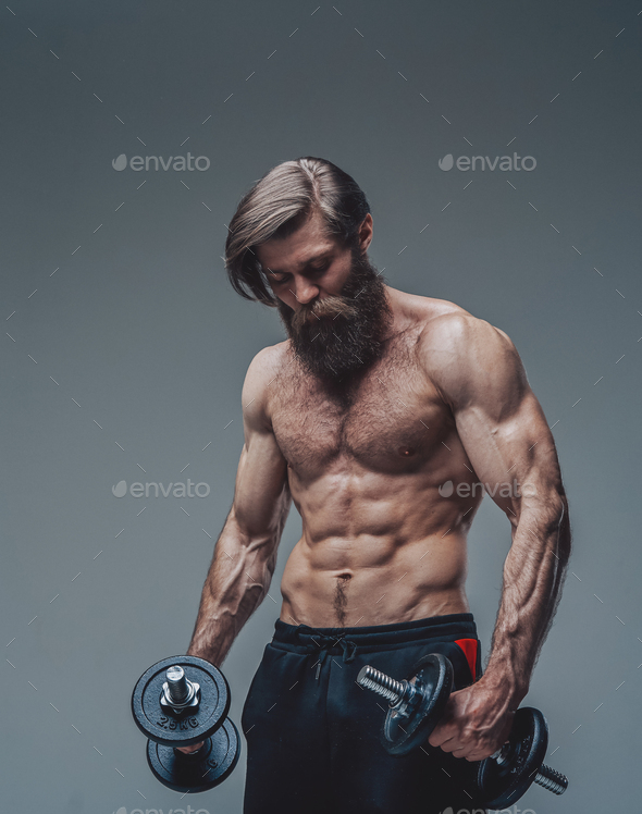 Strong Bodybuilder With Dumbells And Naked Torso Posing In Studio Stock Photo By Fxquadro