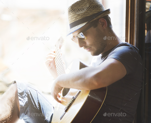 Man playing the guitar - Stock Photo - Images