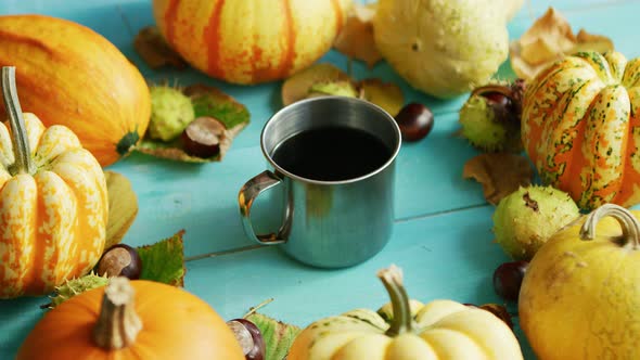 Metal Cup of Coffee with Pumpkins alt