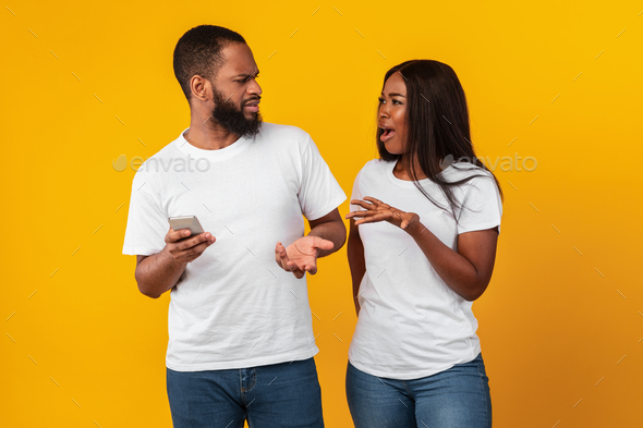 man yelling at woman
