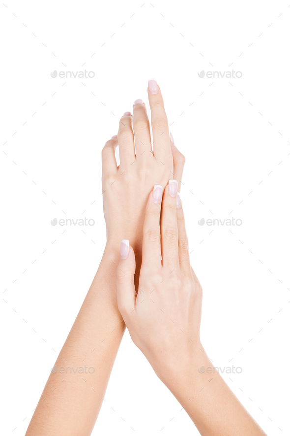 Sensual touch. Close-up of beautiful female hands isolated on white
