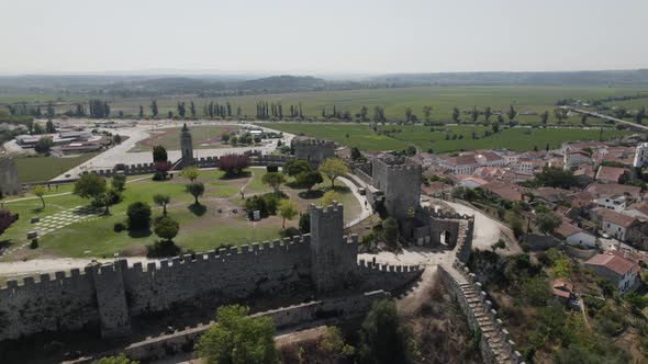 Castle walls of Montemor o Velho castle, Portugal. Aerial orbiting