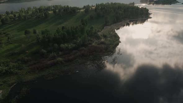 Aerial View of Isles in The Water Reservoir; Drone Flying Down