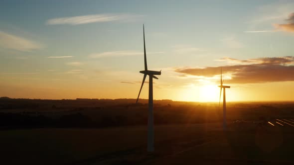 Modern wind farm at sunrise