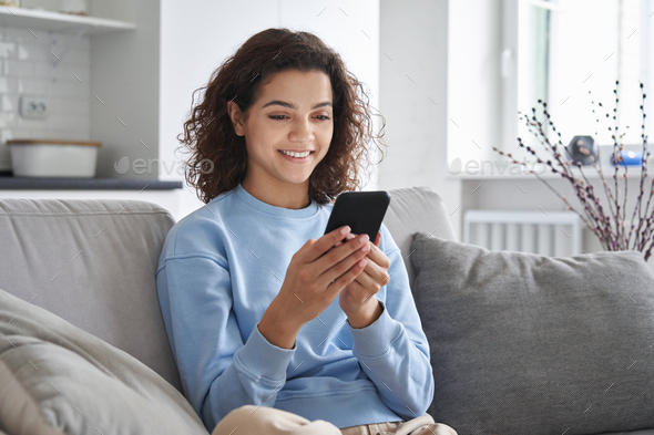 Woman Using a Cell Phone and Stock Photo - PixelTote