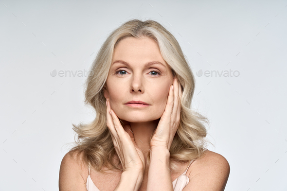 Portrait Of Beautiful 50 Years Old Woman With Perfect Skin Isolated On