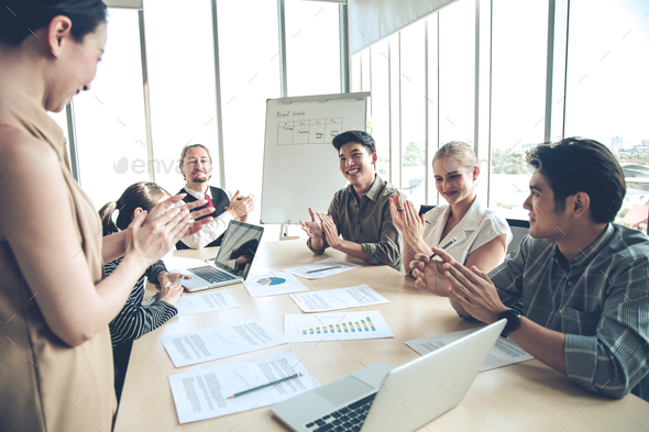 Success of group business people with clap together in meeting room. - Stock Photo - Images