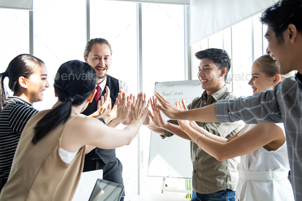 Group business people with join hands of teamwork.