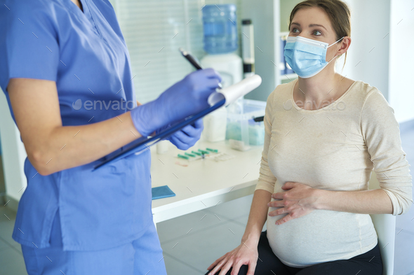 Pregnant woman during a medical interview