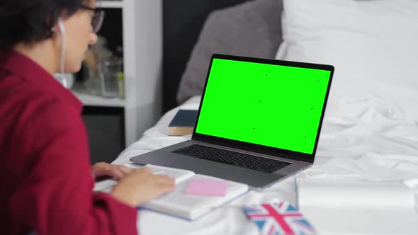 Woman Studying on Laptop