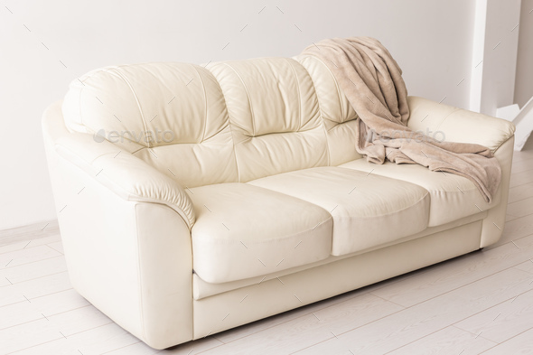Beige sofa in room on white background. Simple minimalistic design Stock  Photo by Satura_