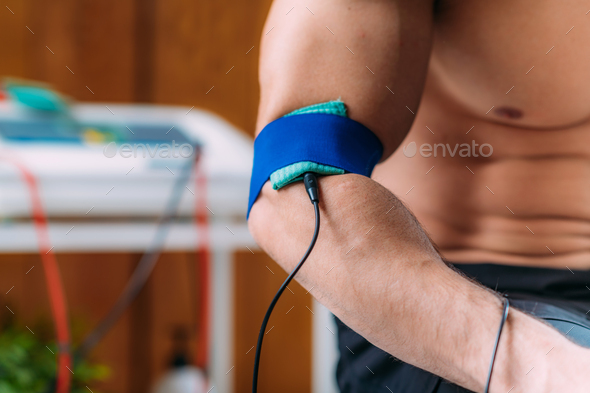 Elbow Physical Therapy with TENS Electrode Brace Pads, Transcutaneous Electrical Nerve Stimulation