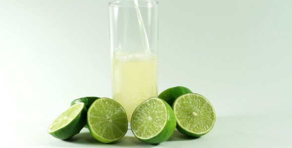 Pouring Citrus Juice on White