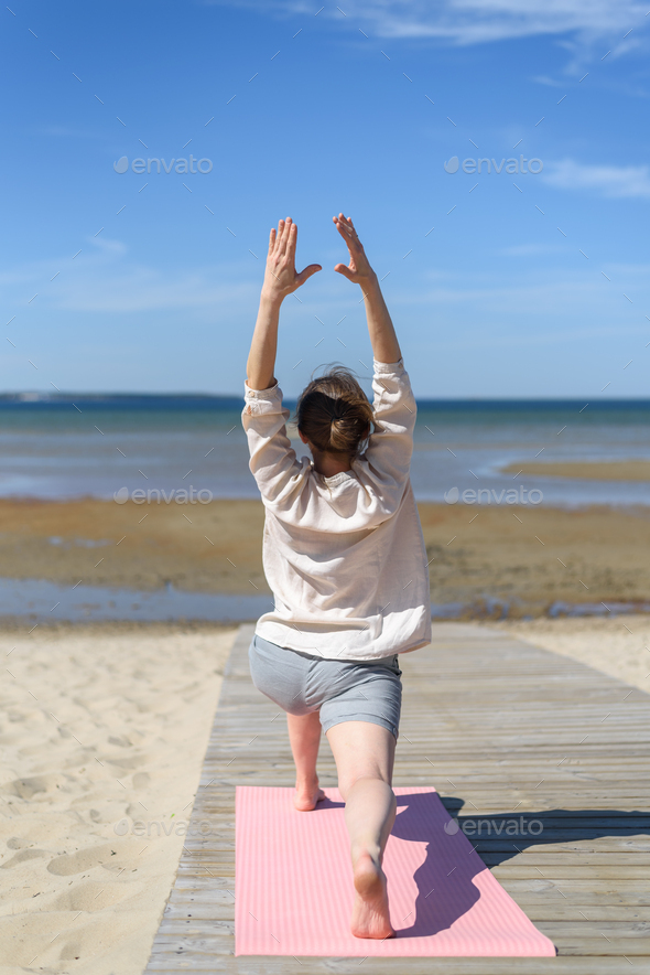 Prop Yourself Up With Sand - 5 Sunny Beach Yoga Poses - DoYou