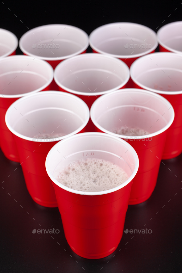 The arrangement of red plastic cups for game of beer pong Stock