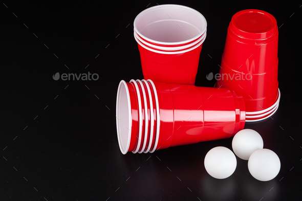 The arrangement of red plastic cups for game of beer pong Stock