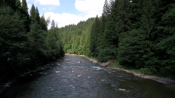 People Rafting at Mountain River Summer Sunny Day alt