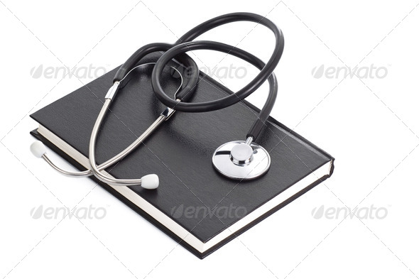 book and stethoscope on white - Stock Photo - Images