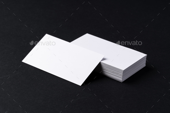 White blank business cards on dark black background Stock Photo by  FabrikaPhoto