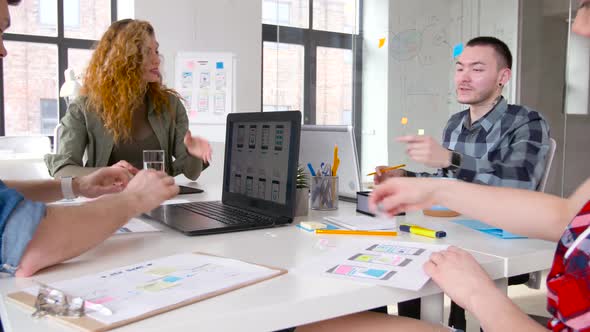 Creative Team Working on User Interface at Office 61 alt