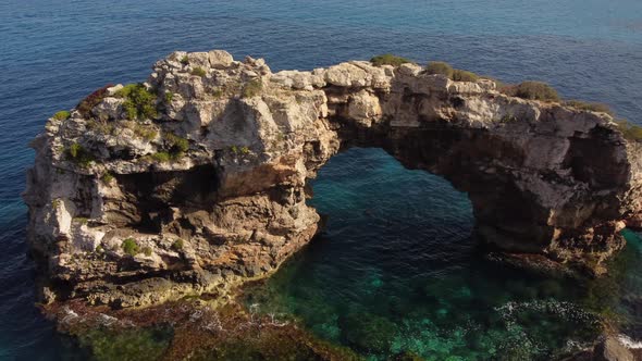 Es Pontas Arch in Cala Santanyi in Mallorca or Majorca, Spain alt