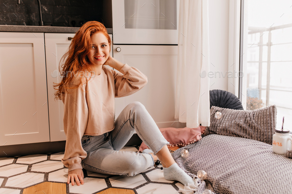 Ginger Blissful Girl Playfully Posing At Home Indoor Photo Of Winsome