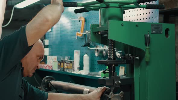 A Locksmith Repairing a Gimbal alt