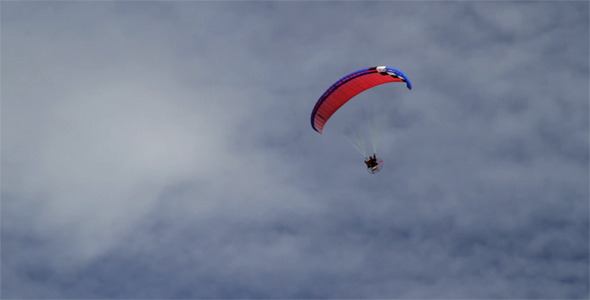 Paragliding In Cloudy Sky