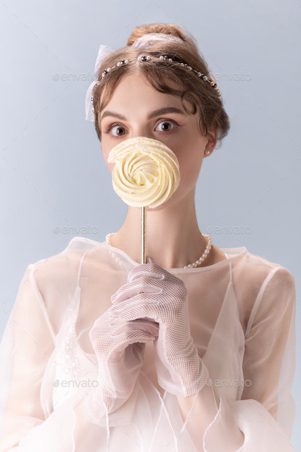Young woman in art action isolated on white background. Retro style, comparison of eras concept - Stock Photo - Images