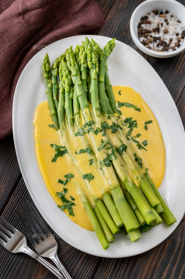 Cooked asparagus with Hollandaise sauce Stock Photo by Alex9500 PhotoDune