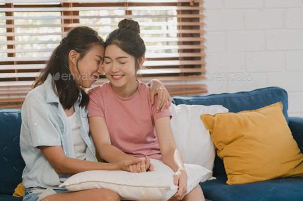 Young Lesbian Lgbtq Asian Women Couple Hug And Kiss At Home Stock