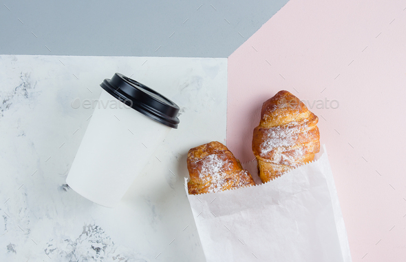 Placeit. Croissants with coffee to go in a paper cup. Mockup
