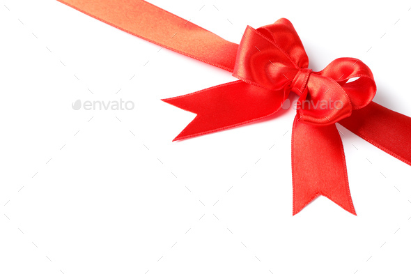 knotted bow made of red silk ribbon isolated on white background