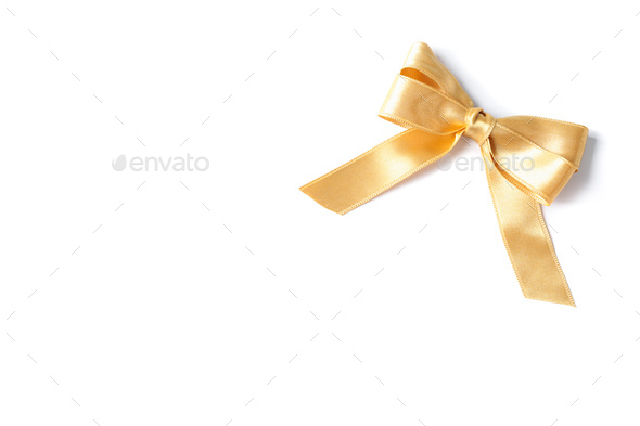 Gold bow isolated on white background. Gift concept Stock Photo by