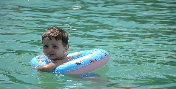 Child In Water Pool