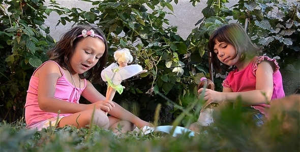 Girls Playing With Dolls