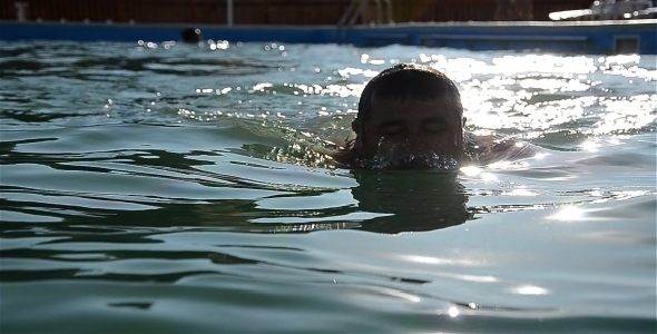 Man Swimming In Pool Water 1