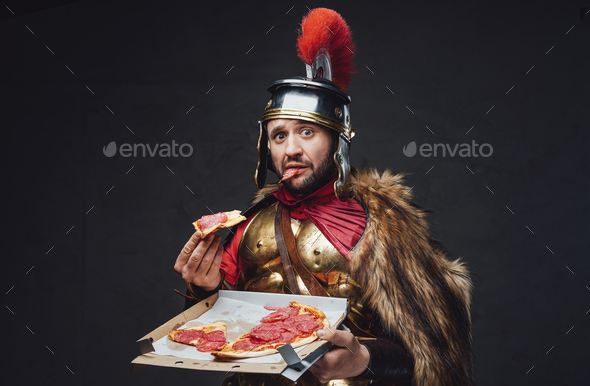 Amazed military roman with pizza slice and box