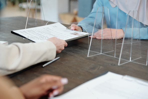 Applying resume for job through barrier screen Stock Photo by Pressmaster