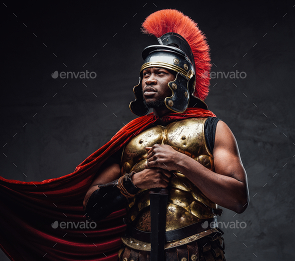 Proud roman warrior of african descent holding gladius