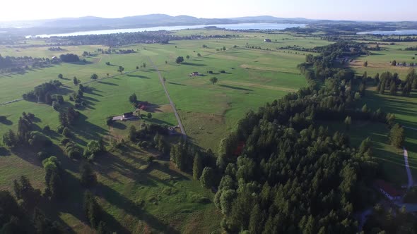 Aerial view of a village and Forggensee lake, Germany alt