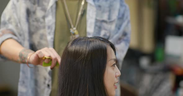 Woman with hair dye in beauty salon