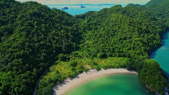 An aerial view of the coast, mountains with many beautiful islands alt