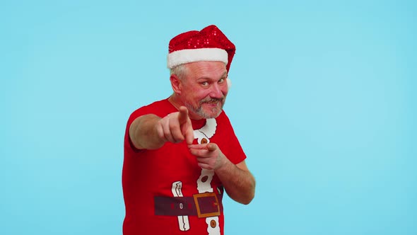 Man in Red Christmas Tshirt Smiling Excitedly Pointing to Camera Beauty Choosing Lucky Winner alt