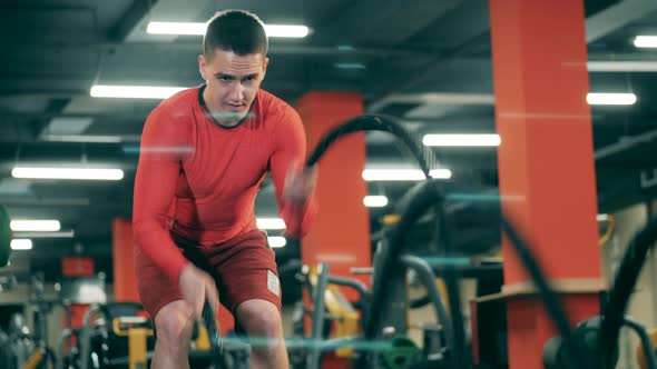 Man Is Doing Crossfit Workout Gym alt