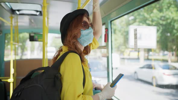 t Female Passenger Wearing Medical Mask and Gloves To Protect Against Virus and Infection During