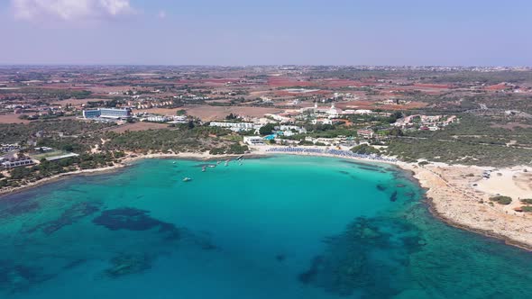 City with Multistory Buildings Against Mountains at Dawn