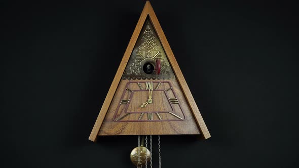Mechanical Clock With A Cuckoo On A Black Background 3