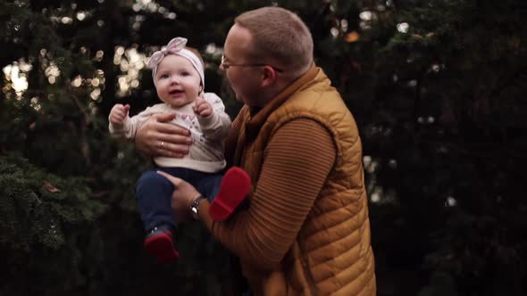 Baby Laughing While Father Throwing Up and Catching Child