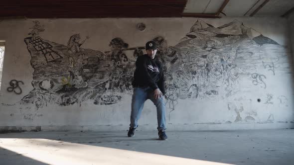 Modern dance in an old building - graffiti background alt